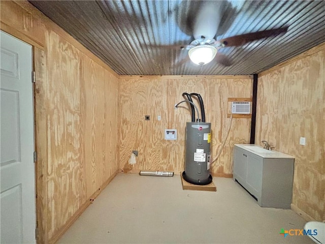 utility room featuring a wall unit AC and water heater