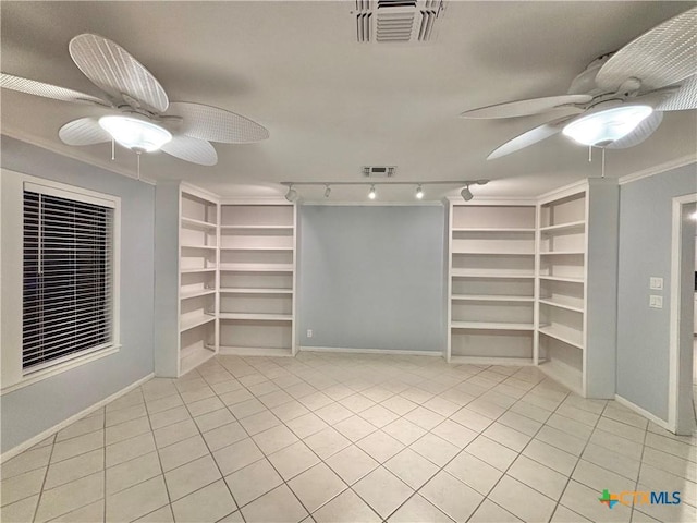 walk in closet with light tile patterned flooring and ceiling fan