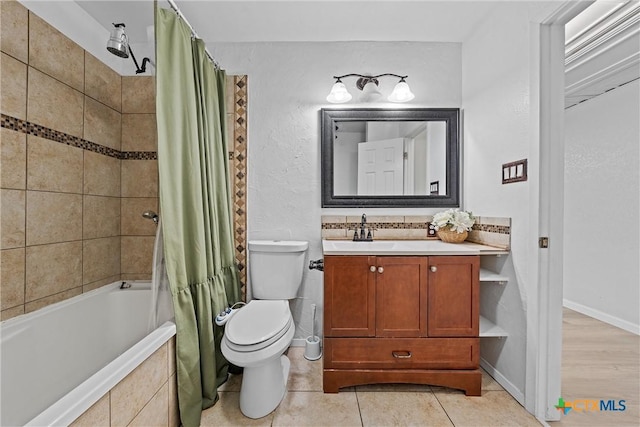 full bathroom with vanity, tasteful backsplash, tile patterned floors, toilet, and shower / bath combo with shower curtain