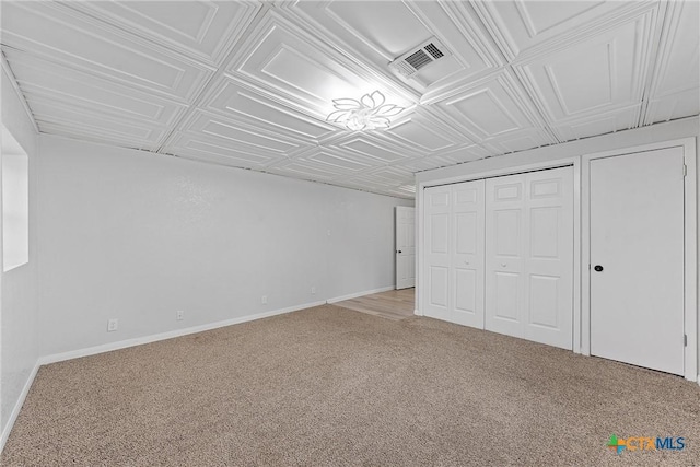 unfurnished bedroom with carpet floors