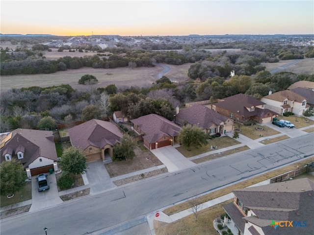 view of aerial view at dusk