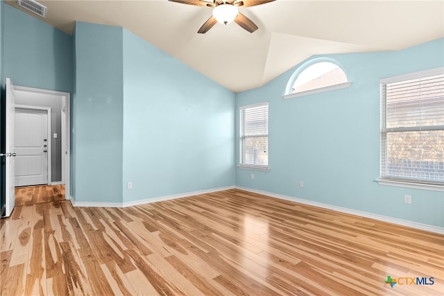 unfurnished room featuring lofted ceiling, light hardwood / wood-style flooring, and ceiling fan