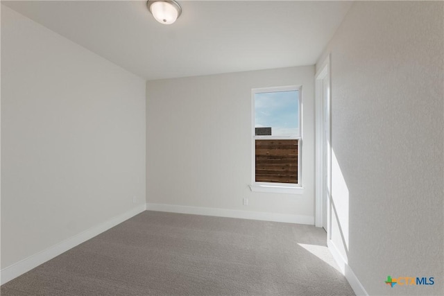 spare room with carpet flooring