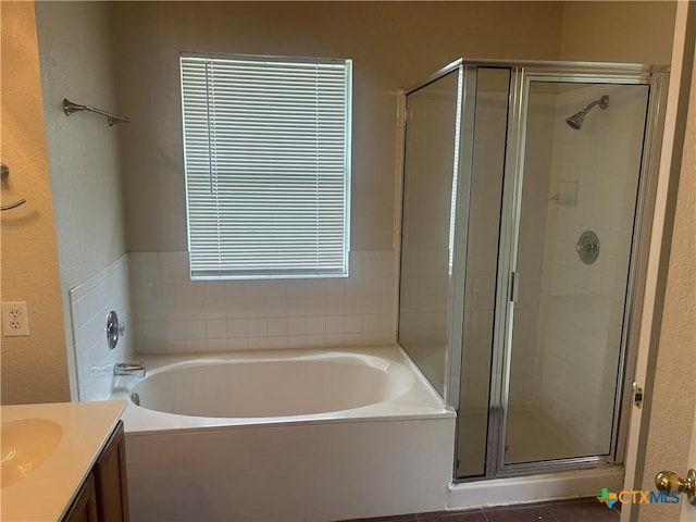 3502 Levy Ln, Killeen, TX 76542 - full bath featuring a stall shower, a bath, vanity, and a textured wall