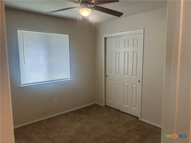 3502 Levy Ln, Killeen, TX 76542 - unfurnished bedroom with carpet, a closet, a textured ceiling, and a ceiling fan