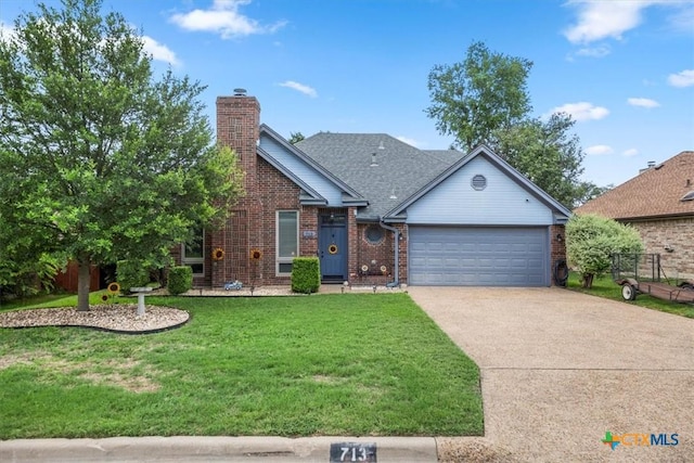 713 End O Trl, Harker Heights, TX 76548 - view of front of house featuring an attached garage, driveway, a front yard, brick siding, and a chimney