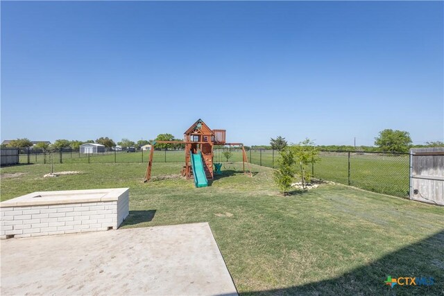 4324 Cedar Creek Rd, Temple, TX 76504 - view of yard with a playground and a patio area