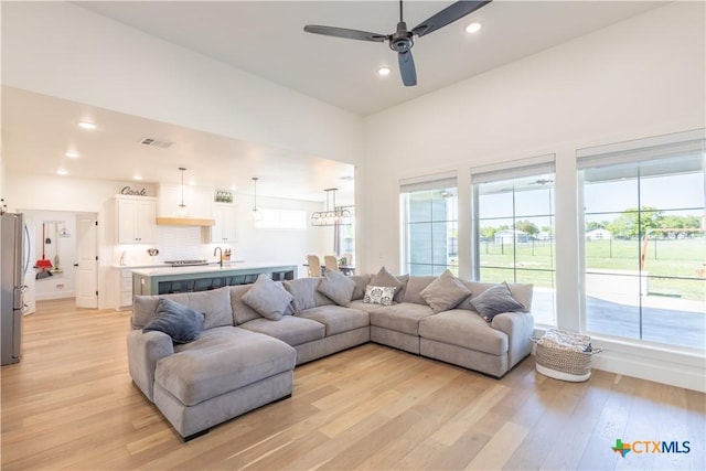 4324 Cedar Creek Rd, Temple, TX 76504 - living area featuring light wood-style flooring, ceiling fan, and recessed lighting