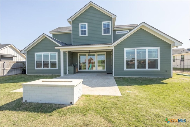 4324 Cedar Creek Rd, Temple, TX 76504 - back of property with a patio area and a shingled roof