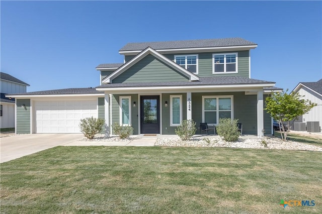 4324 Cedar Creek Rd, Temple, TX 76504 - view of front facade with an attached garage, driveway, a porch, a front lawn, and a shingled roof