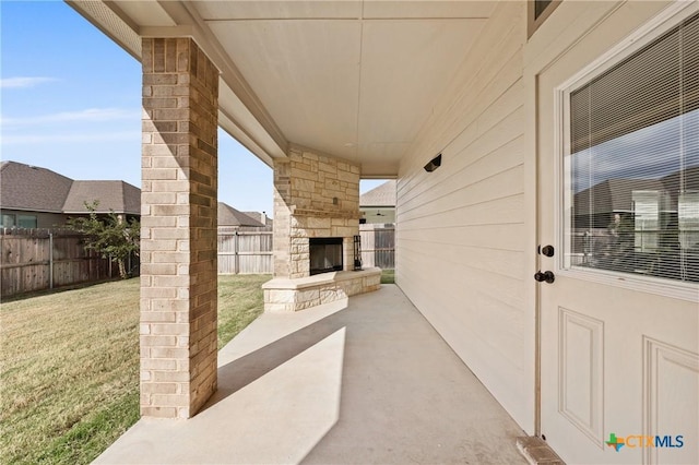 10205 Eaglefire Dr, Temple, TX 76502 - view of patio featuring an outdoor stone fireplace