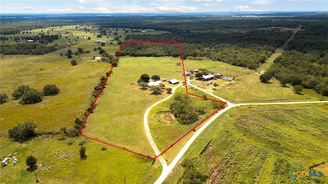 birds eye view of property featuring a rural view