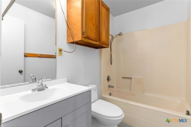 full bathroom featuring shower / washtub combination, toilet, and vanity