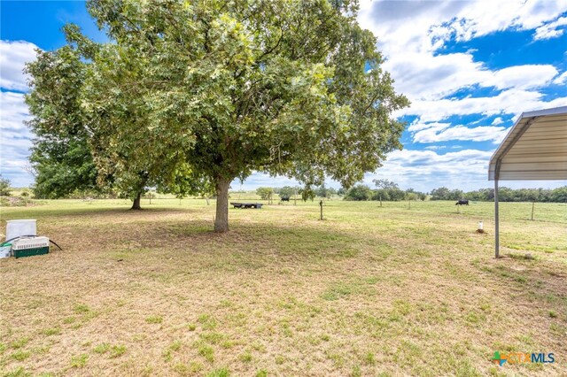 view of yard featuring a rural view