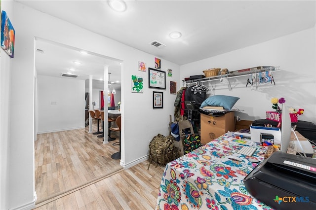 bedroom featuring light hardwood / wood-style floors