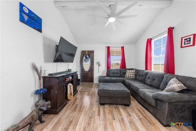 living room with lofted ceiling with beams, ceiling fan, and light hardwood / wood-style flooring