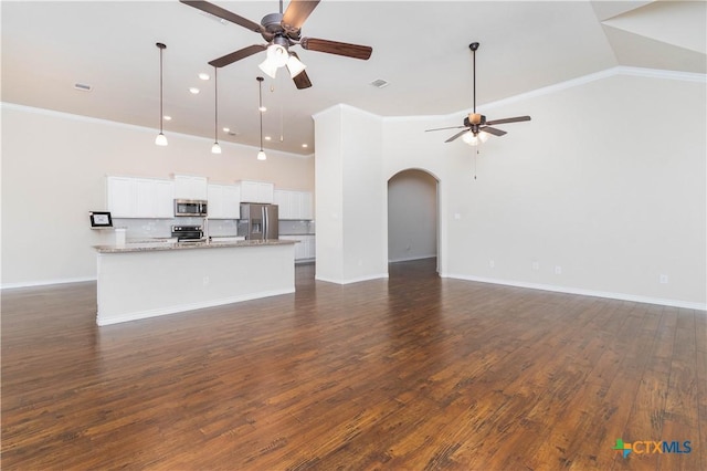 unfurnished living room with crown molding, high vaulted ceiling, ceiling fan, and dark hardwood / wood-style floors