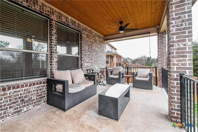 view of patio featuring an outdoor hangout area and ceiling fan