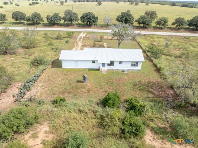 birds eye view of property featuring a rural view