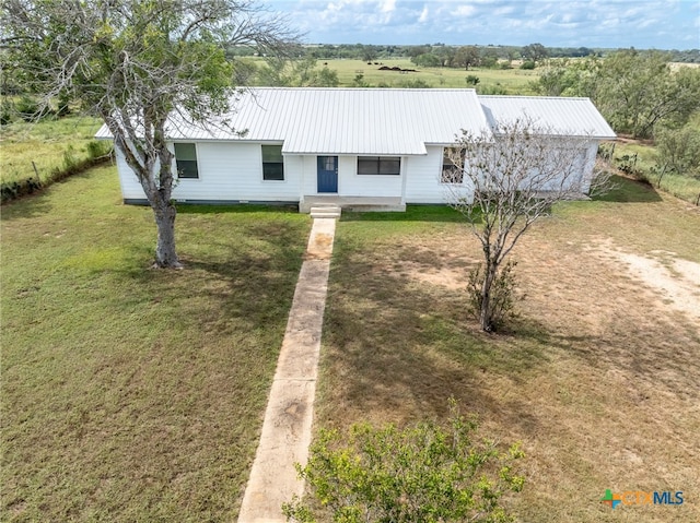 ranch-style home with a front yard