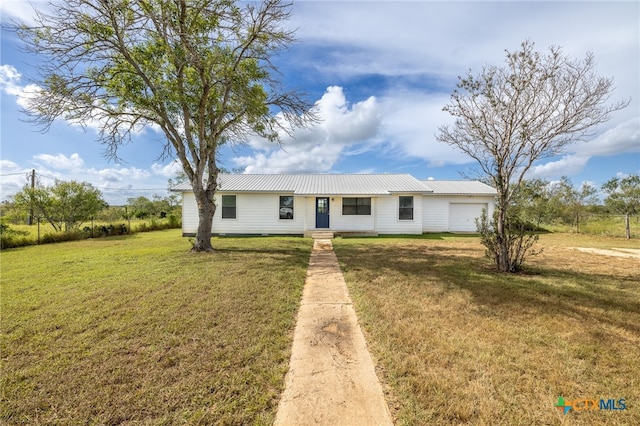 ranch-style house with a front yard