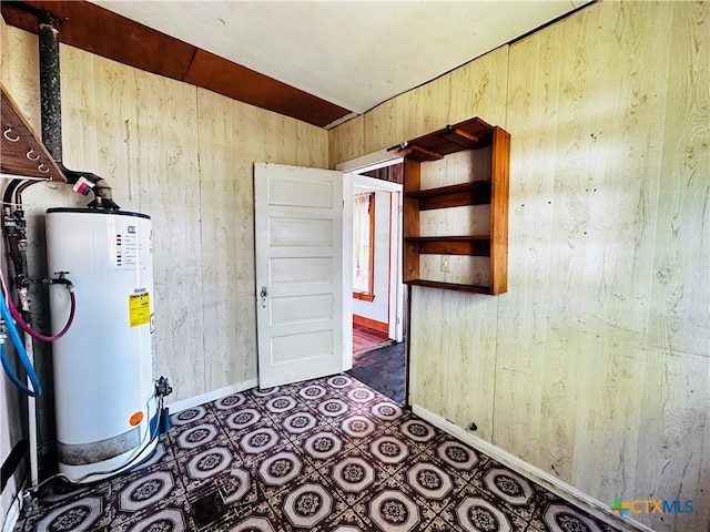 utility room with water heater