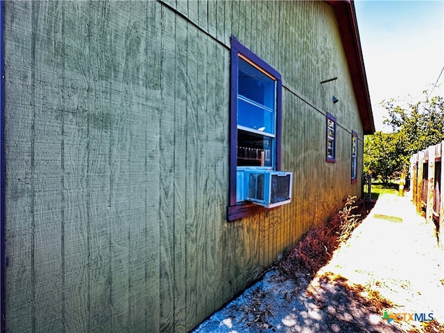 view of home's exterior with cooling unit