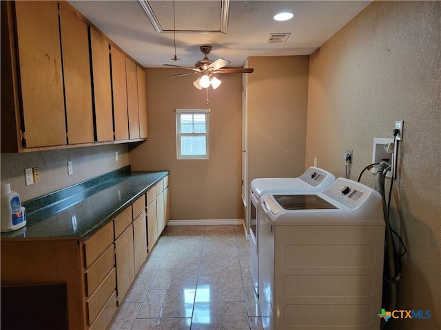 laundry area featuring cabinets, light tile patterned floors, washer and dryer, and ceiling fan