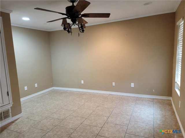 empty room with crown molding, ceiling fan, and light tile patterned flooring