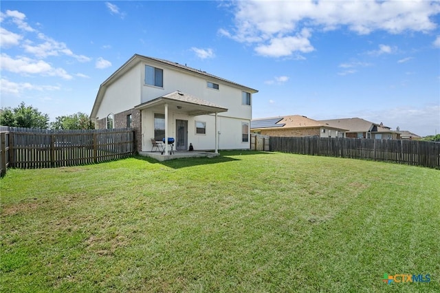 6804 Bayberry Dr, Killeen, TX 76542 - back of property featuring a patio area, a fenced backyard, and stucco siding