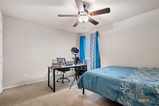 6804 Bayberry Dr, Killeen, TX 76542 - carpeted bedroom with a desk and a ceiling fan