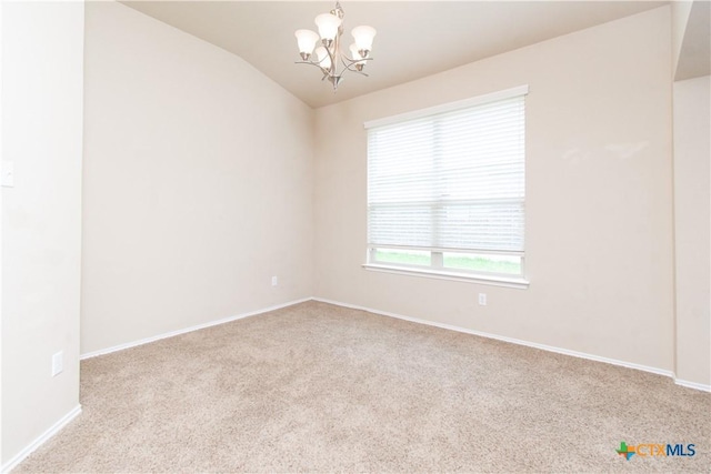7010 Cokui Dr, Killeen, TX 76542 - carpeted empty room with a chandelier and vaulted ceiling