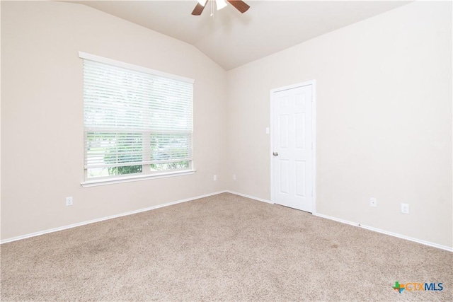 7010 Cokui Dr, Killeen, TX 76542 - empty room featuring a ceiling fan, vaulted ceiling, and carpet floors