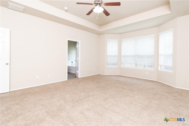 7010 Cokui Dr, Killeen, TX 76542 - empty room with a raised ceiling, carpet floors, a ceiling fan, and a smoke detector