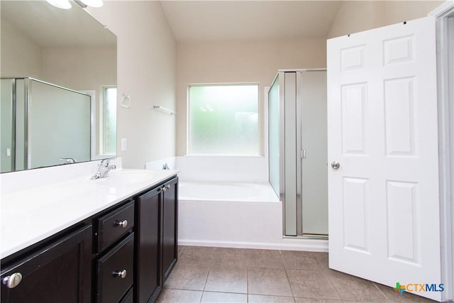 7010 Cokui Dr, Killeen, TX 76542 - bathroom featuring a shower stall, vanity, a bath, and tile patterned flooring