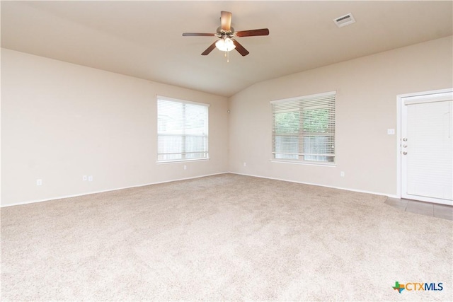 7010 Cokui Dr, Killeen, TX 76542 - carpeted spare room with vaulted ceiling, plenty of natural light, and a ceiling fan