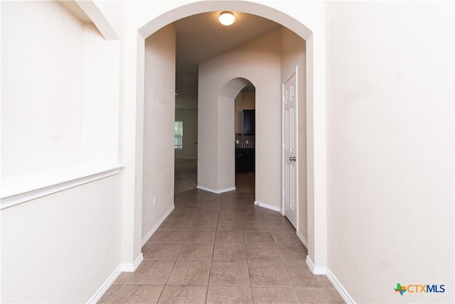 7010 Cokui Dr, Killeen, TX 76542 - corridor with light tile patterned floors and baseboards