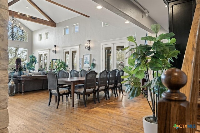 913 Southridge Rd, Salado, TX 76571 - dining room with high vaulted ceiling, french doors, beamed ceiling, light wood-style floors, and recessed lighting
