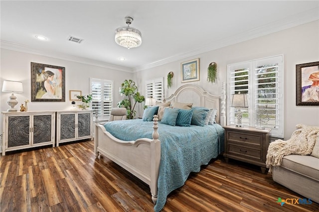 913 Southridge Rd, Salado, TX 76571 - bedroom featuring dark wood finished floors, crown molding, multiple windows, recessed lighting, and a chandelier