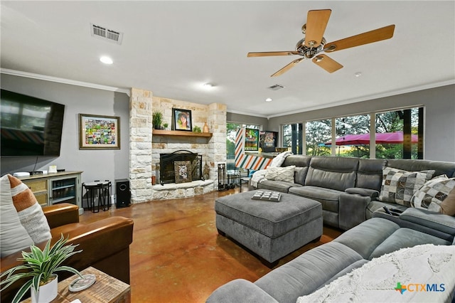 913 Southridge Rd, Salado, TX 76571 - living room with crown molding, concrete floors, a stone fireplace, a ceiling fan, and recessed lighting