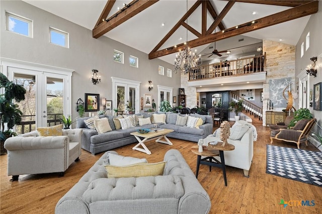 913 Southridge Rd, Salado, TX 76571 - living area with high vaulted ceiling, french doors, beamed ceiling, ceiling fan, and wood finished floors