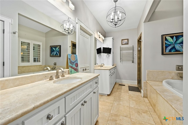 913 Southridge Rd, Salado, TX 76571 - bathroom featuring a chandelier, two vanities, a bath, a stall shower, and tile patterned floors