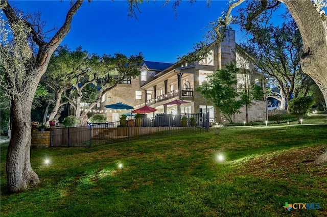913 Southridge Rd, Salado, TX 76571 - view of side of home featuring a balcony, a chimney, and a metal roof