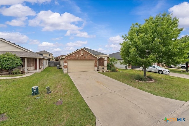 824 Starlight Dr, Temple, TX 76502 - ranch-style home featuring brick siding, a garage, and driveway