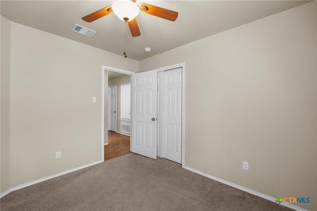 824 Starlight Dr, Temple, TX 76502 - unfurnished bedroom with carpet, baseboards, a closet, and ceiling fan