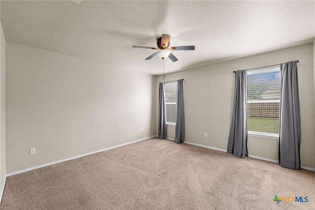 824 Starlight Dr, Temple, TX 76502 - empty room with ceiling fan, light carpet, and baseboards