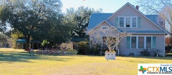 exterior space featuring a front yard