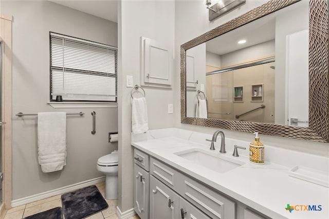 1207 Old Homestead, Seguin, TX 78155 - bathroom with vanity, a shower with shower door, and tile patterned floors