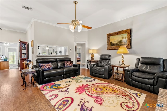 1207 Old Homestead, Seguin, TX 78155 - living area with a ceiling fan, crown molding, and wood finished floors