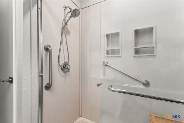 1207 Old Homestead, Seguin, TX 78155 - full bathroom featuring a shower stall